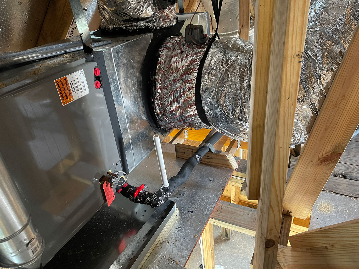 Photo of residential furnace heating in the attic space